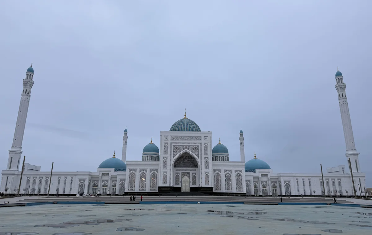 The white marble mosque of the Imam al-Bukhari memorial complex near Samarkand