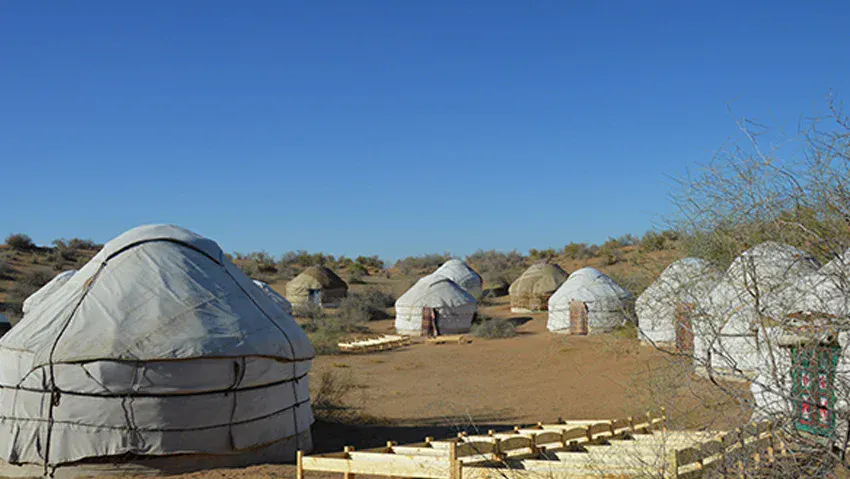 Yurt camp overview on the desert lake shore near Samarkand